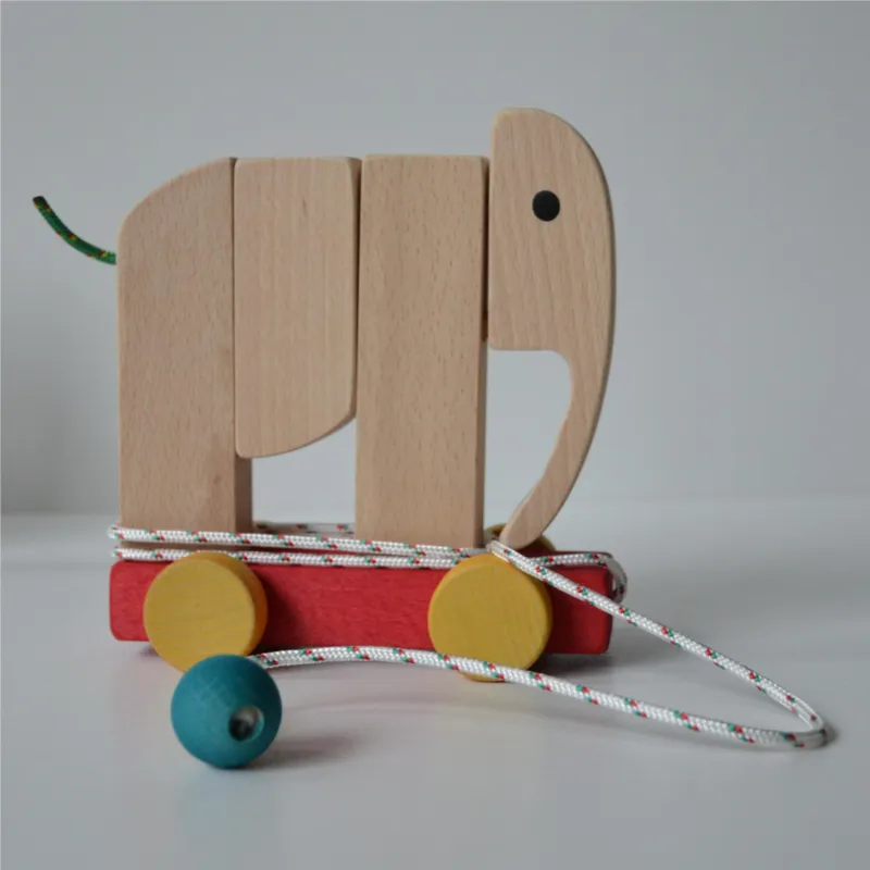 Compra Adesso Elefante con ruote, 14x8x h14 cm pezzi smontabili così da poterlo trasformare in rinoceronte, coniglio e cordino per poterlo trascinare rosso Manzoni Pietro