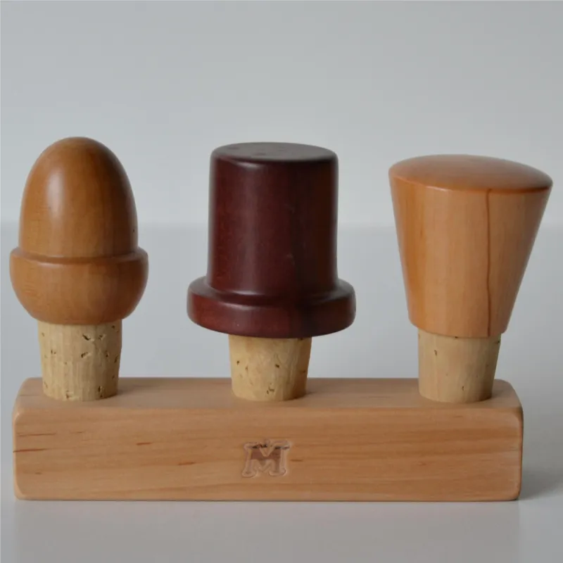 SET di 3 tappi in legno e sughero per bottiglie in vetro, in colore e forme assortiti Dimensioni 12x3,5xh11 legno Naturale e Mogano Manzoni Pietro Bestseller